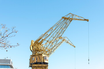 Naklejka premium Yellow inactive historical cranes, in Puerto Madero, Buenos Aires, Argentina