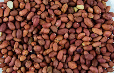 Peeled peanuts, all over the background.