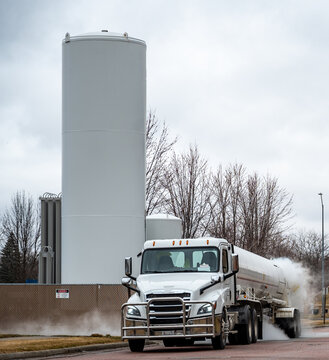 Liquid Oxygen Being Unloaded From A Semi Truck Into Storage Tanks At A Medical Facility In A Residential District