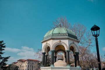 Turkey istanbul 03.03.2021.Sultanahmet square and old ancient public fountain established by ottoman empire period with magnificent engravings and painting called as german fountain (alman cesmesi)