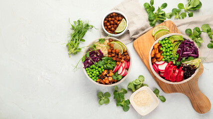 Tasty colorful vegan poke bowl on light gray background.