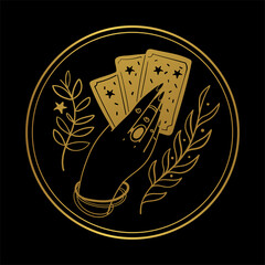 Graceful female hand of a gypsy woman holds tarot cards. Round gold icon on a black background. The concept of divination, witchcraft, fate, card game. Vector illustration isolated on background. - obrazy, fototapety, plakaty