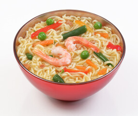 Chinese noodles with vegetables, soy sauce on a white plate