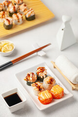 Japanese food sushi roll set with soy sauce on the table