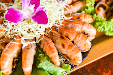 Seafood buffet Thai food, Grilled shrimp prawn with fresh vegetable and seafood sauce shrimps grilled serve on tray