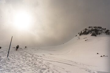 Beautiful winter views of the High Tatra Mountains with tourists, skiers and amazing states of...