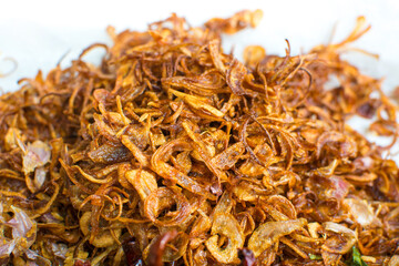 Cooking components of Thai food. Chili, garlic, onion, kaffir lime leaves, pork crackling, fried.