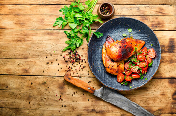 Grilled chicken,chicken breast on rustic wooden table