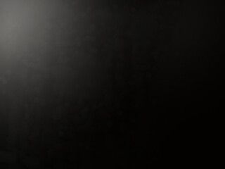 Abstract light bokeh on black background.