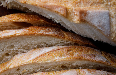 White bread slices close up. Village bread.