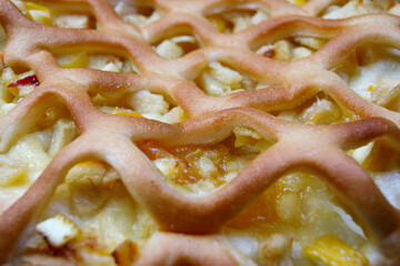 Apple pie close-up. Filling with apples and zuckats.
