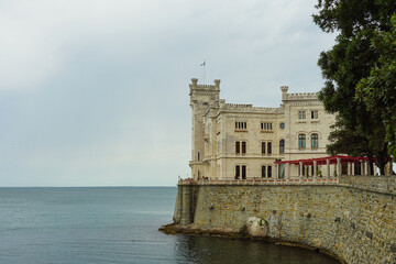 Fototapeta na wymiar View of Miramare Castle against moody sky, Trieste, Italy