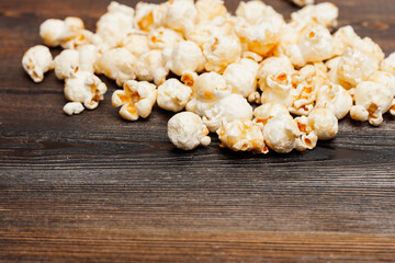 popcorn on a wooden table snack classic delicacy entertainment