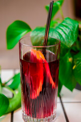 One fruit drink on a white table in restaurant or cafe.