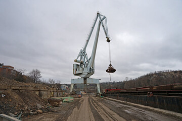 Historic crane for using for loading and unloading boats, industrial harbour in Holesovice, Prague, Czech Republic