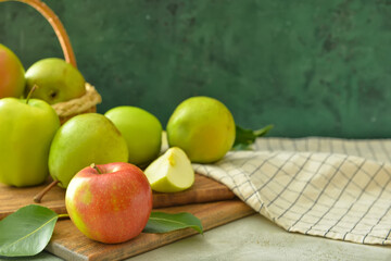 Tasty apple and pear fruits on color background