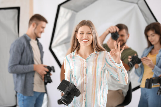 Portrait Of Female Photographer In Studio