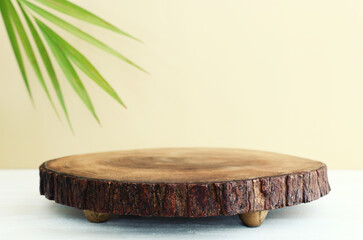 product display concept. minimal scene with wooden shapes on beige background