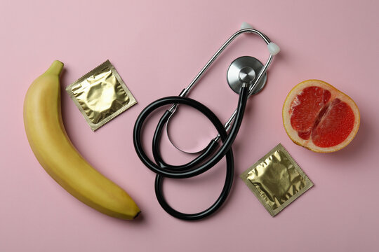 Sex concept on pink background, top view