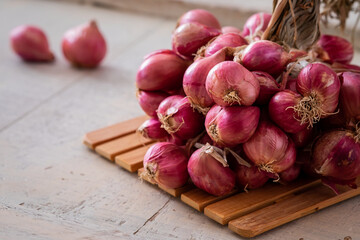 Bunch of shallot on wooden table