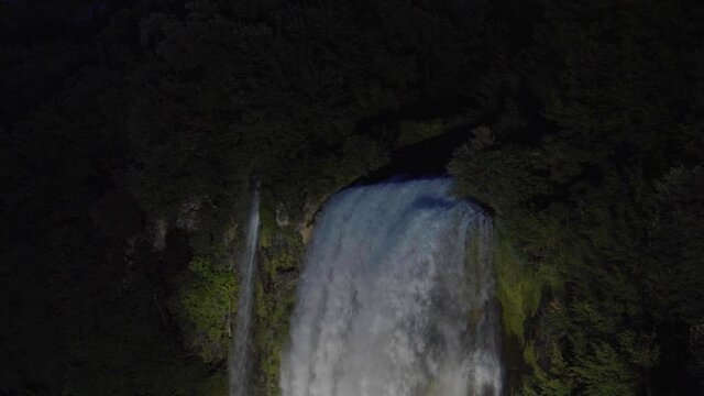 Water discharge, strong, maximum flow. Rainbow. The Cascata delle Marmore is a the largest man-made waterfall. Terni in Umbria Italy. Hydroelectric power plant. night.