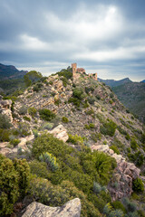 Fototapeta na wymiar Castillo de Serra, en medio de la Sierra de la Calderona, Valencia, España