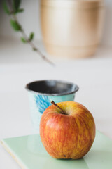 Apple, healthy and dietary fruit displayed on a kitchen table