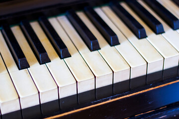 Piano keyboard, black and white key, close-up and macro, retro and vintage piano