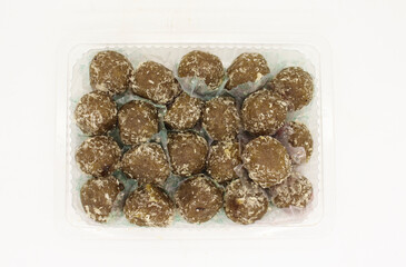 Amla Ladoo, pure and health sweets which use for traditional and regular use amla laddoo contain of natural amla and sugar, garnesing with coconut.