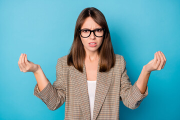 Photo of sad brunette lady ask money wear spectacles brown jacket isolated on vivid blue background