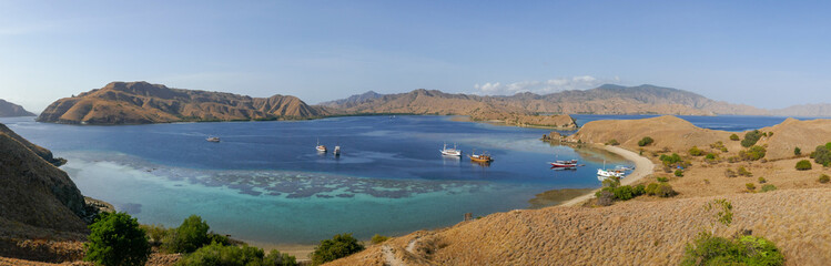 Beautiful panorama of Gili Lawa Darat with Komodo island in background, Komodo National Park, Flores, East Nusa Tenggara, Indonesia © Cyril Redor