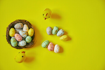 Easter eggs on yellow background. Happy Easter. Holiday concept.