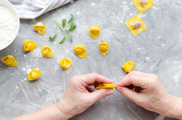Proccess of making traditional Italian tortellini