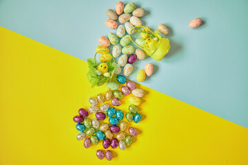 Easter eggs on the yellow-blue background. Happy Easter. Holiday concept. Focus on eggs.