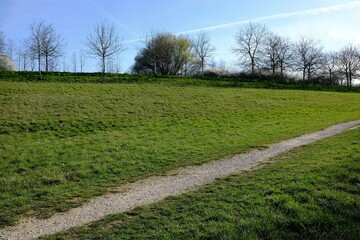 Beautiful agricultural pathway in northern France on a sunny day