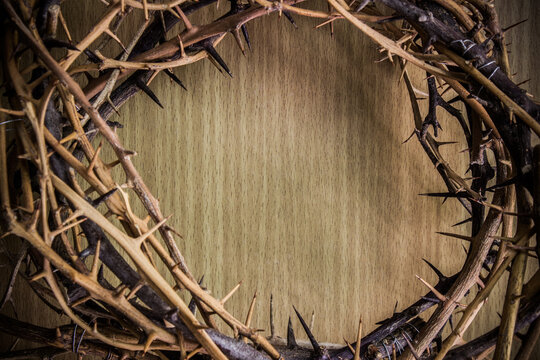Crown of thorns on wooden table. religion concept
