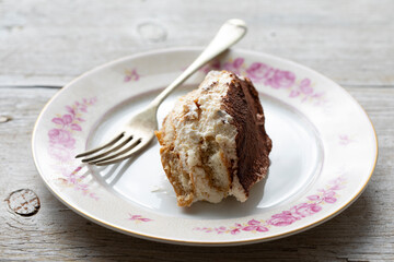 Italian tiramisu dessert on the plate