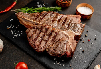 Grilled T-Bone Beef Steak on a stone background