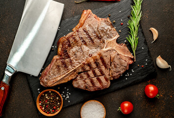 Grilled T-Bone Beef Steak on a stone background