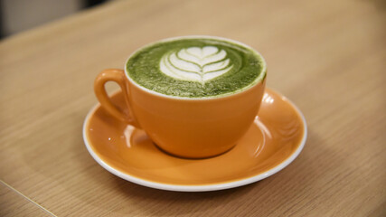 Matcha latte drink served on the table