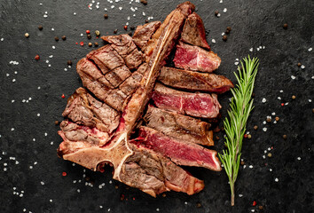 Grilled T-Bone Beef Steak on a stone background