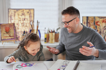 Happy attractive caucasian family creative art hobby and funny tome spending. Caring dad or...
