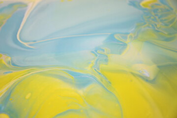 mixed blue and yellow paint on canvas