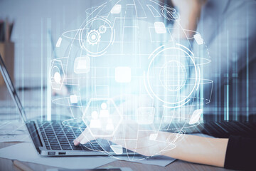 Double exposure of woman hands typing on computer and social network theme hologram drawing. People media concept.