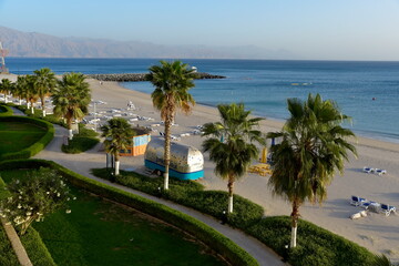 Fototapeta na wymiar Radisson Blu Beach resort, Dibba, Al Fujairah, United Arab Emirates March 21, 2021, view of beach and sea (Gulf of Oman) at the beach resort hotel