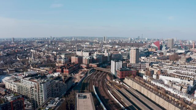 Aerial drone shot over Kensigton and Chelsea wealthy west London and victoria station