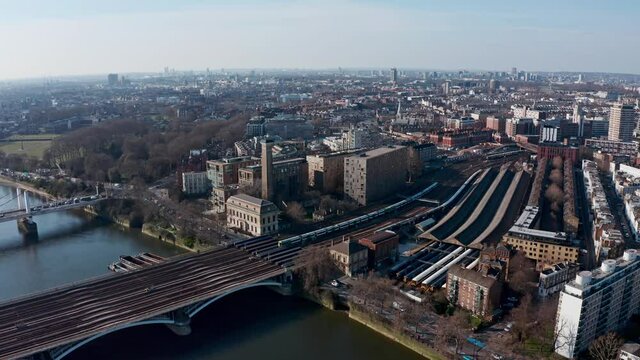 Cinematic circling aerial Drone shot of Grosvenor road and railway bridge London