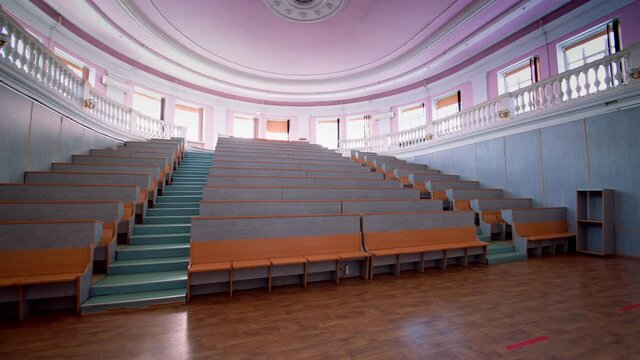 An empty lecture hall in a University. Interior of contemporary lecture theater in university campus