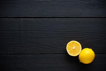 Bright lemon on the rustic background. Backgrounds and textures.