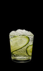 cucumber water in glass glass isolate on black background